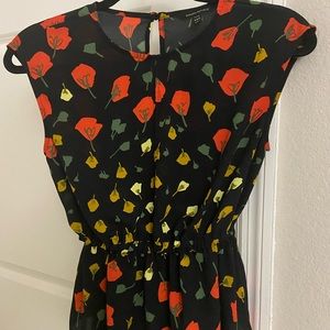 Banana republic -xxs dress shirt. Small slit in front/back, cinched at waist.